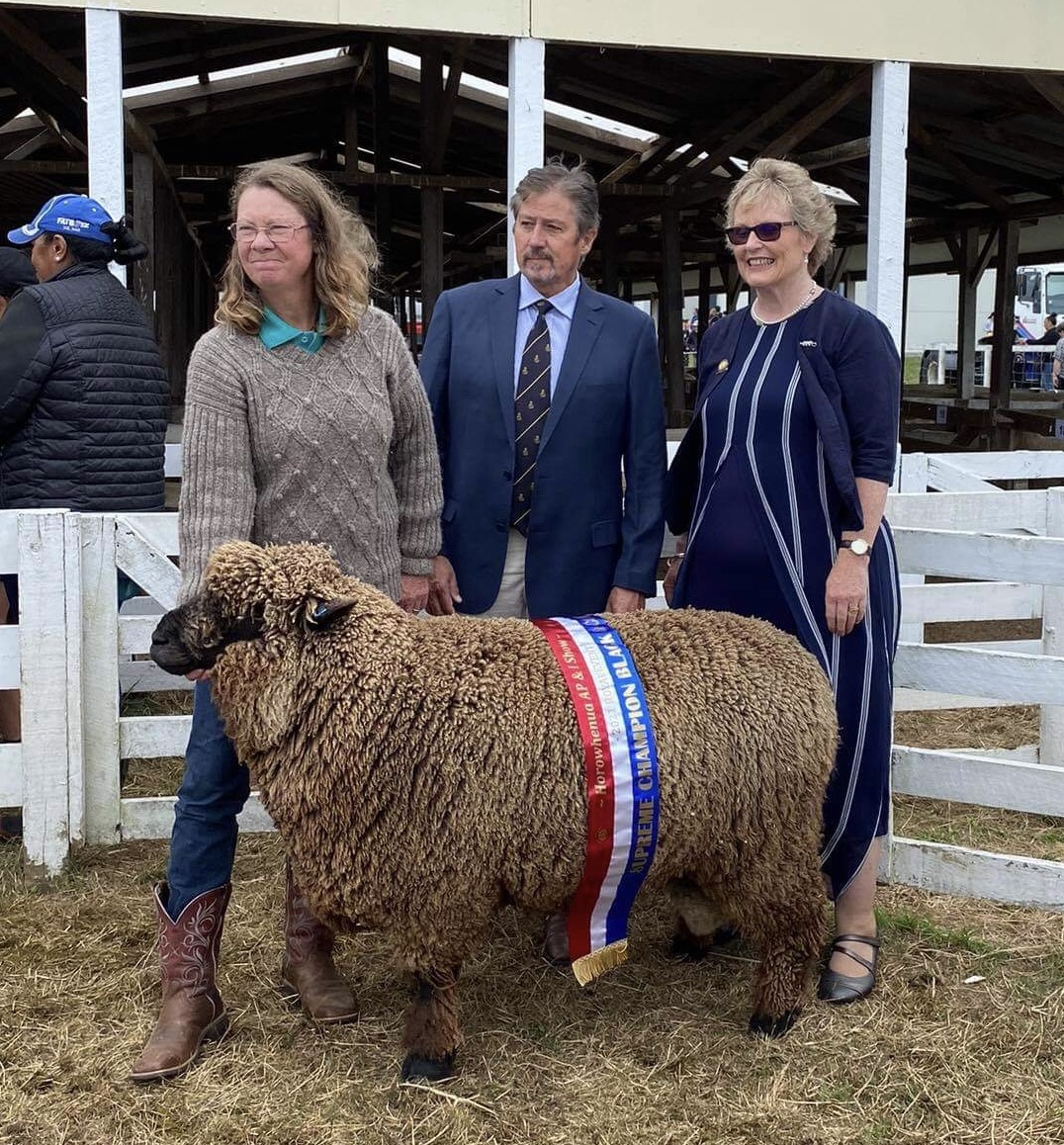 lynley winning prize with sheep